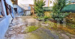 PORZIONE CON CORTILE E ORTO