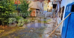 PORZIONE CON CORTILE E ORTO