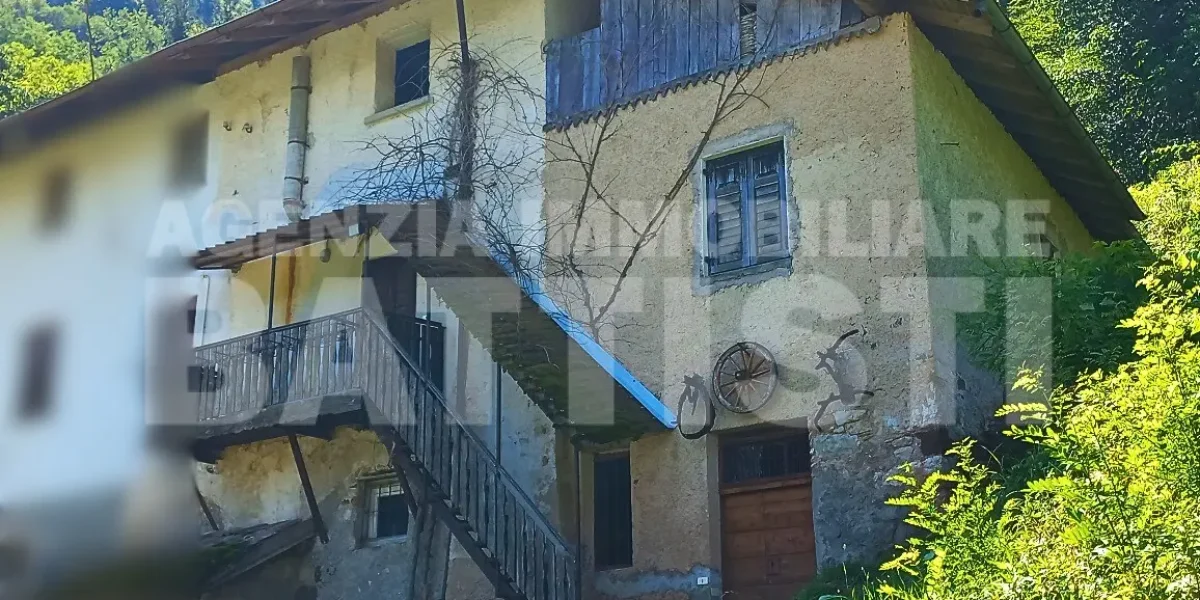 PORZIONE DI MASO CON TERRENO
