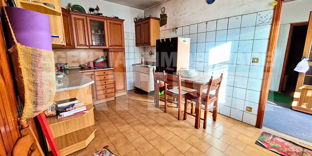 PORZIONE CON CORTILE E ORTO