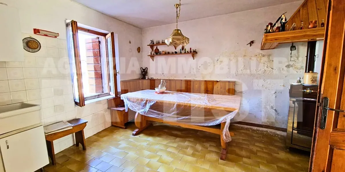 PORZIONE TERRA-TETTO
