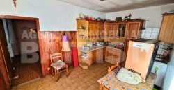 PORZIONE CON CORTILE E ORTO