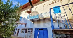 PORZIONE CON CORTILE E ORTO