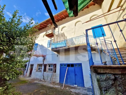 PORZIONE CON CORTILE E ORTO