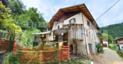 PORZIONE DI CASA con terreno di mq 700