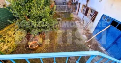 PORZIONE CON CORTILE E ORTO