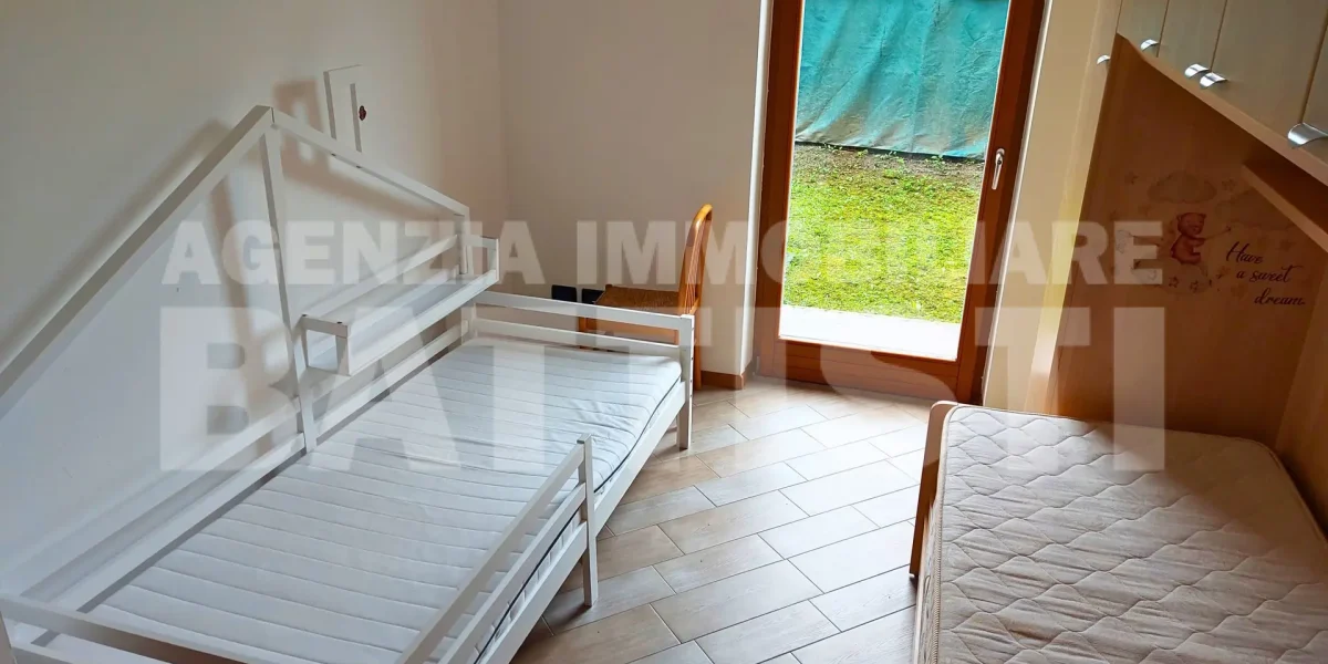 AMPIO APPARTAMENTO CON GIARDINO