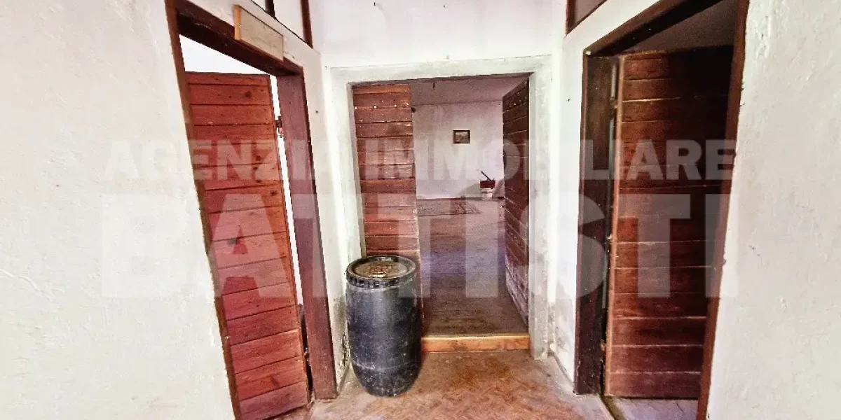 CASA INDIPENDENTE CON TERRENO