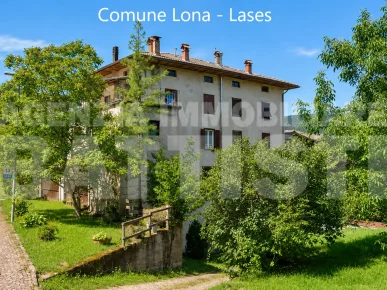 APPARTAMENTO CON GARAGE E POSTO AUTO – LONA / LASES