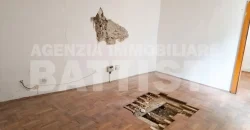 PORZIONE CON DUE ALLOGGI DA RIQUALIFICARE