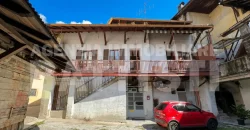 PORZIONE CON NEGOZIO E RUSTICO