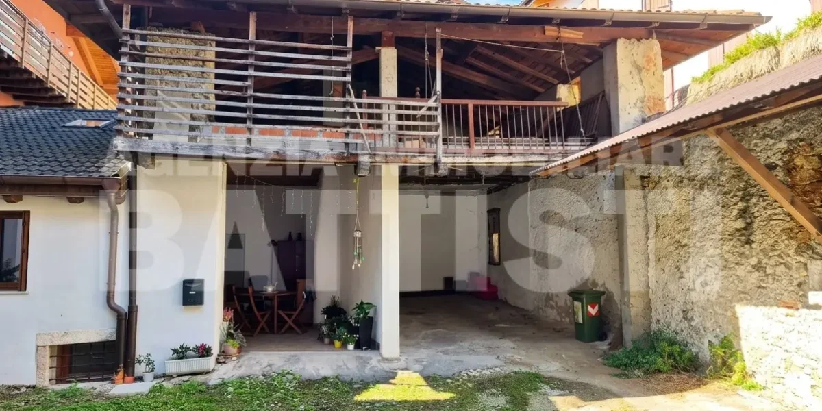 PORZIONE CON NEGOZIO E RUSTICO