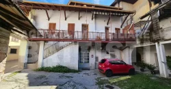PORZIONE CON NEGOZIO E RUSTICO