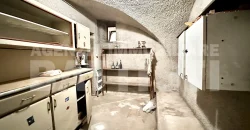 ALLOGGIO IN CENTRO CON AMPIO POSTO AUTO